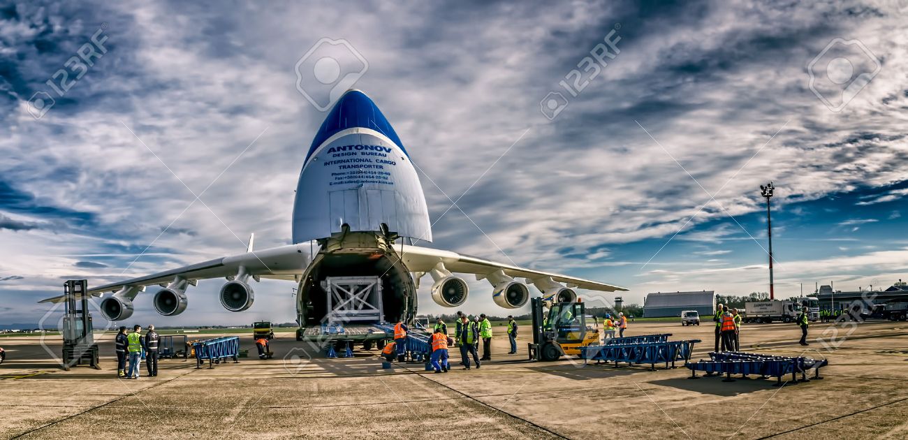 ZAGREB, CROATIA - NOVEMBER 10: Loading heavy weight cargo to the Antonov 225 Mriya airplane shoot as HDR on November 10, 2013 Zagreb, Croatia. It is the biggest airplane in the world. - 25220399 ZAGREB, CROATIA - NOVEMBER 10: Loading heavy weight cargo to the Antonov 225 Mriya airplane shoot as HDR on November 10, 2013 Zagreb, Croatia. It is the biggest airplane in the world. - 25220399