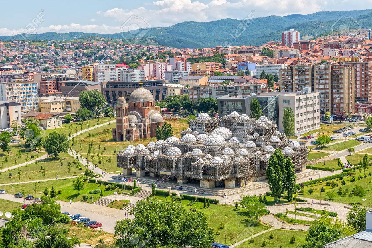 PRISTINA, KOSOVO - JULY 01, 2015: Aerial view of capital city with some old buildings like National Public Library and Christ the Saviour Cathedral. - 44425463 PRISTINA, KOSOVO - JULY 01, 2015: Aerial view of capital city with some old buildings like National Public Library and Christ the Saviour Cathedral. - 44425463