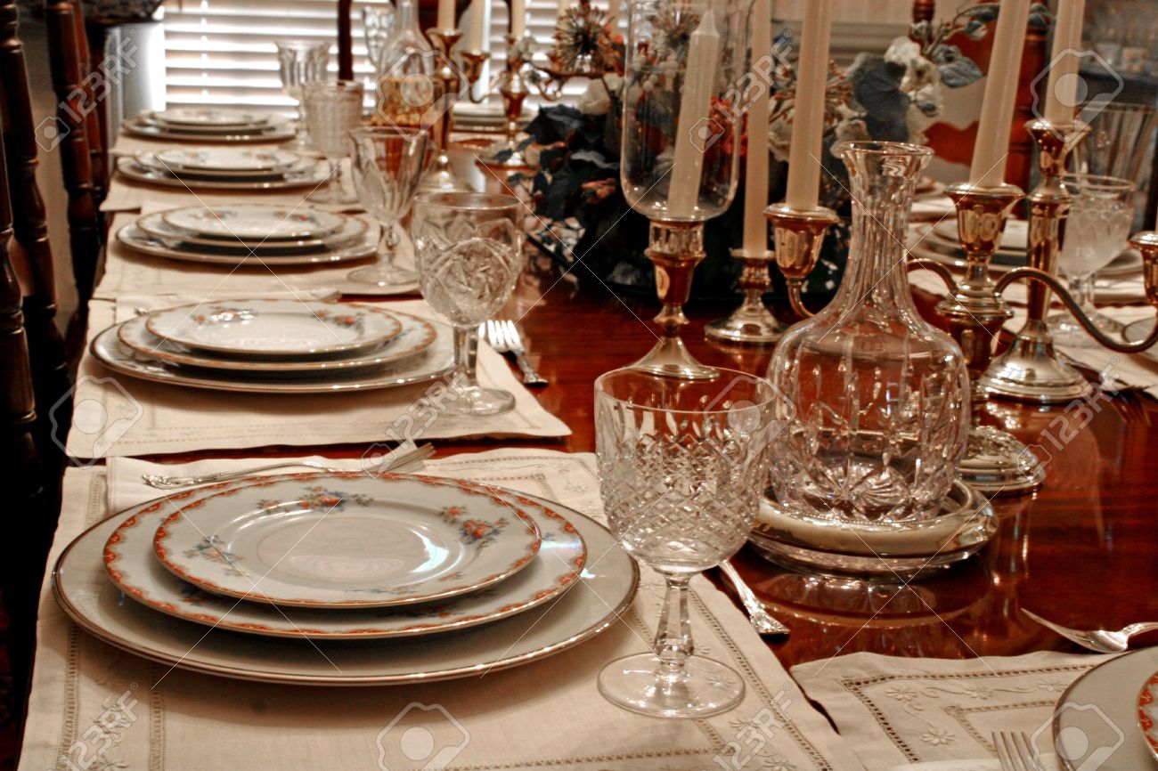 A Formal Dining Table Set With China, Crystal, And Candles Stock ... A Formal Dining Table Set With China, Crystal, And Candles Stock ...