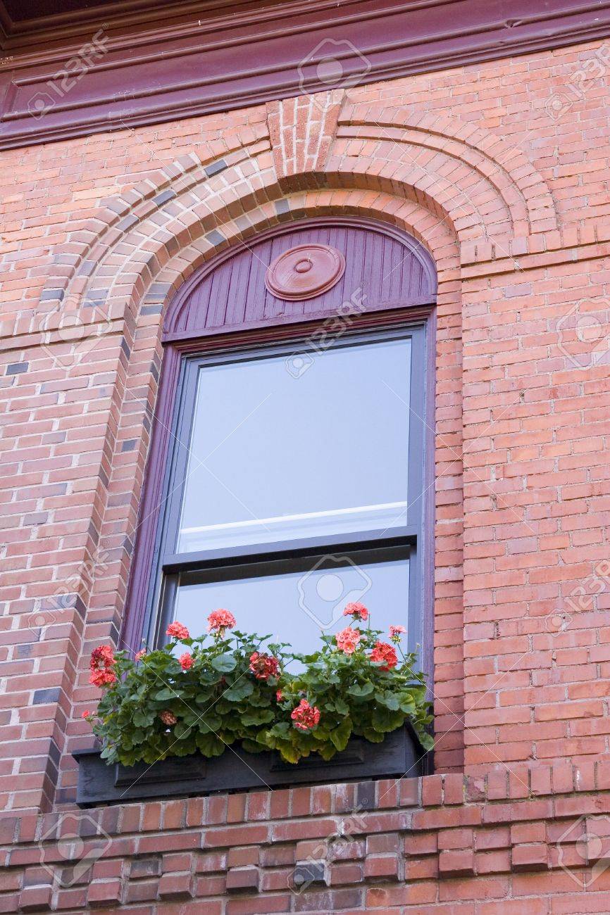 An Old Brick Apartment Building With Flower Boxes In Windows Stock Photo 2009314 An Old Brick Apartment Building With Flower Boxes In Windows Stock Photo 2009314