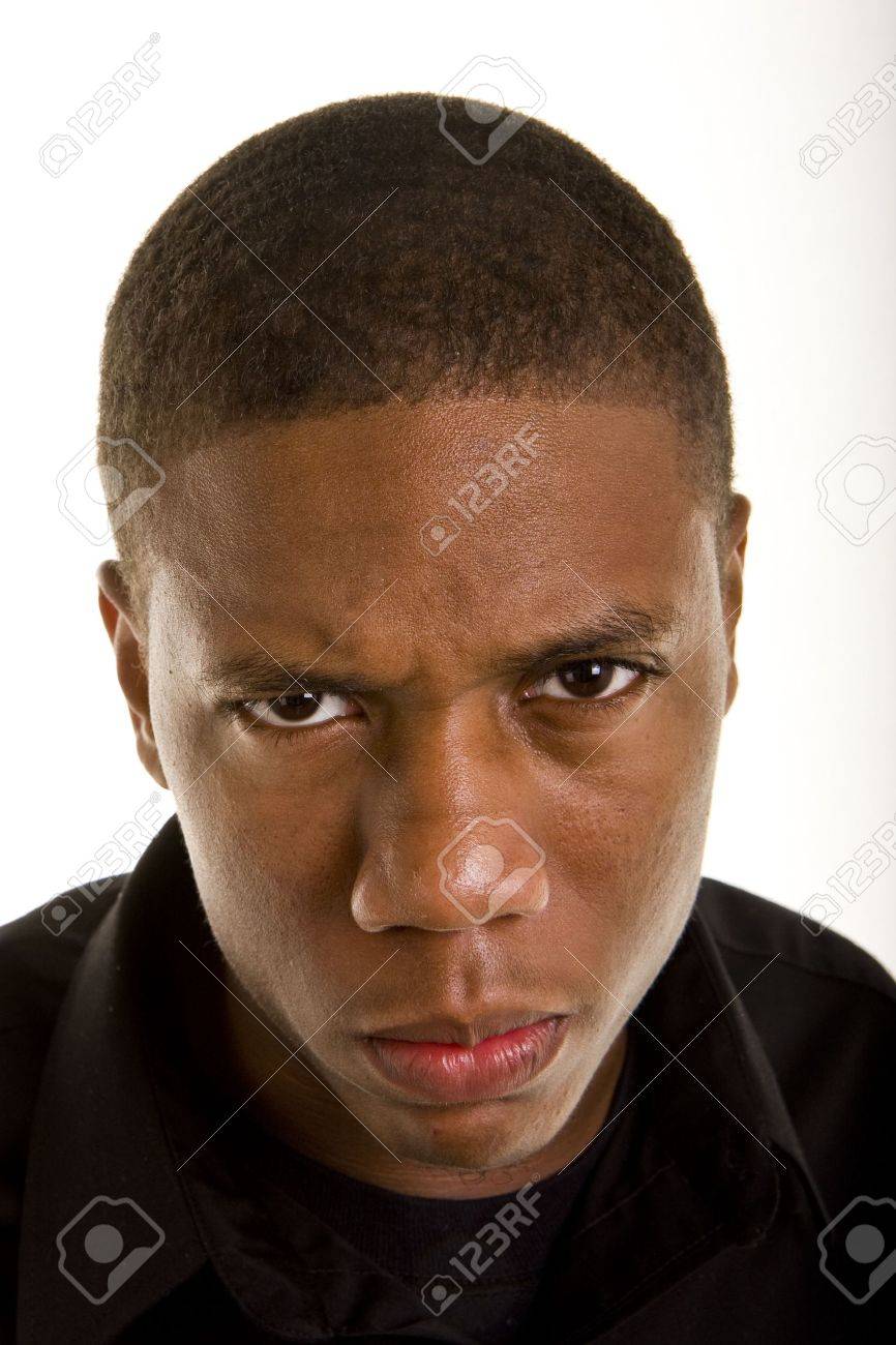 An Angry Young Black Man Closeup Looking At Camera Stock Photo, Picture And  Royalty Free Image. Image 3765832.