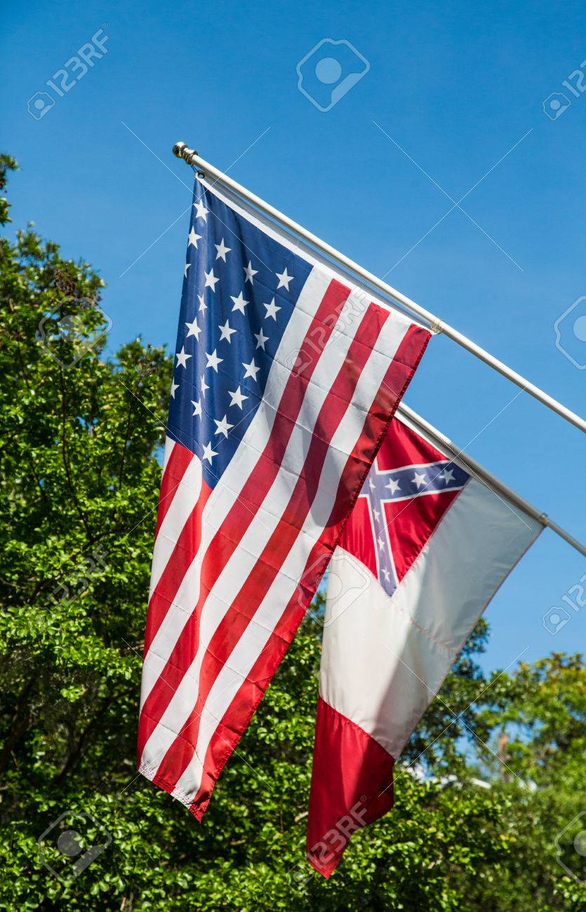 american flag with a flag of the confederate states on green stock