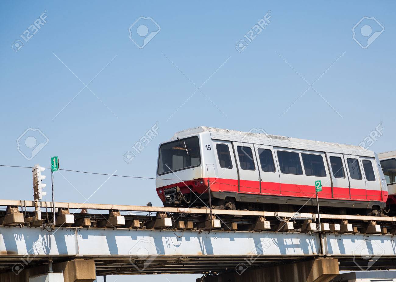 red and silver chicago ohare airport shuttle train on tracks transportation to o hare airport