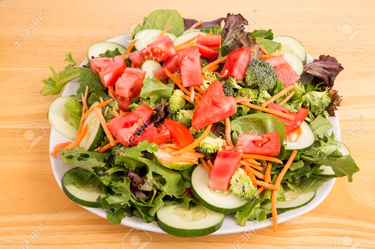 Fresh Salad Of Field Greens Cucumbers Carrots And Choppped Stock Photo Picture And Royalty Free Image Image 30755629