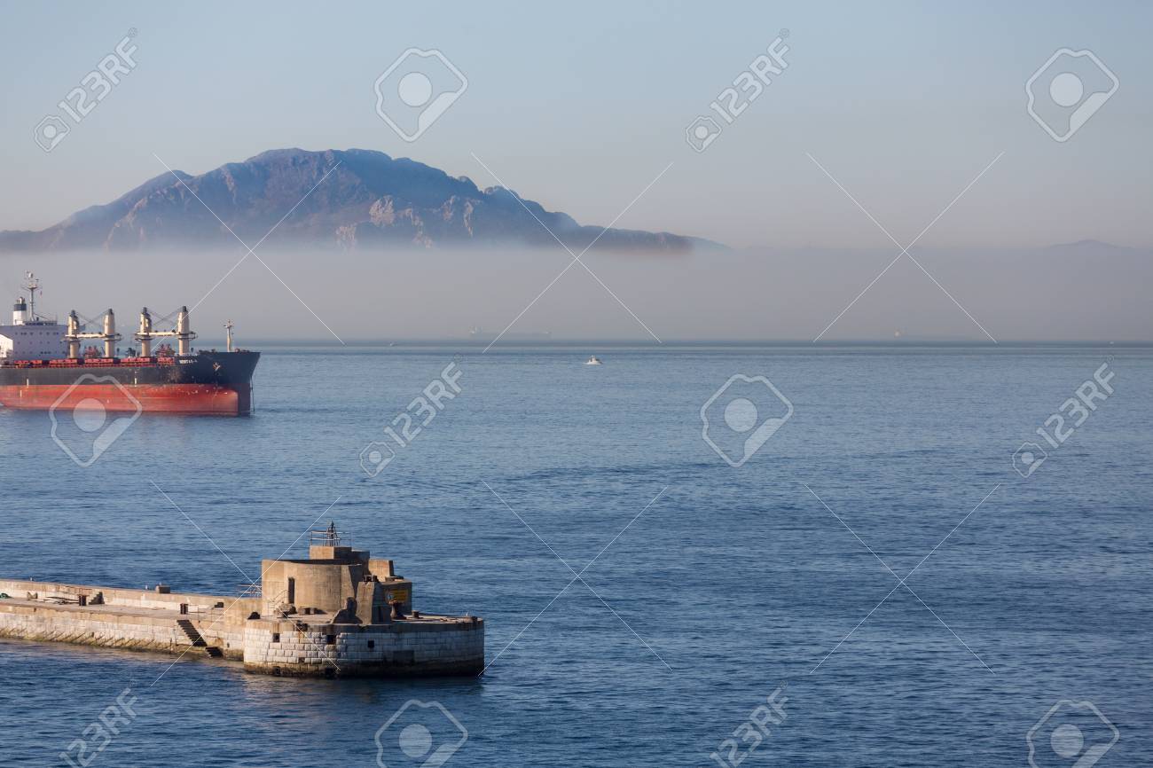 huge tankers in the harbor of gibralter between spain and morocco spain and morocco