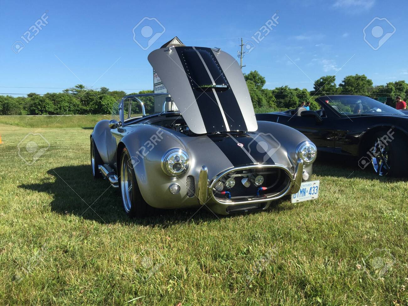 Cobra Kit Car >> Either A Silver Mg Or Cobra Kit Car With Black Stripes At A Cars Cobra Kit Car >> Either A Silver Mg Or Cobra Kit Car With Black Stripes At A Cars