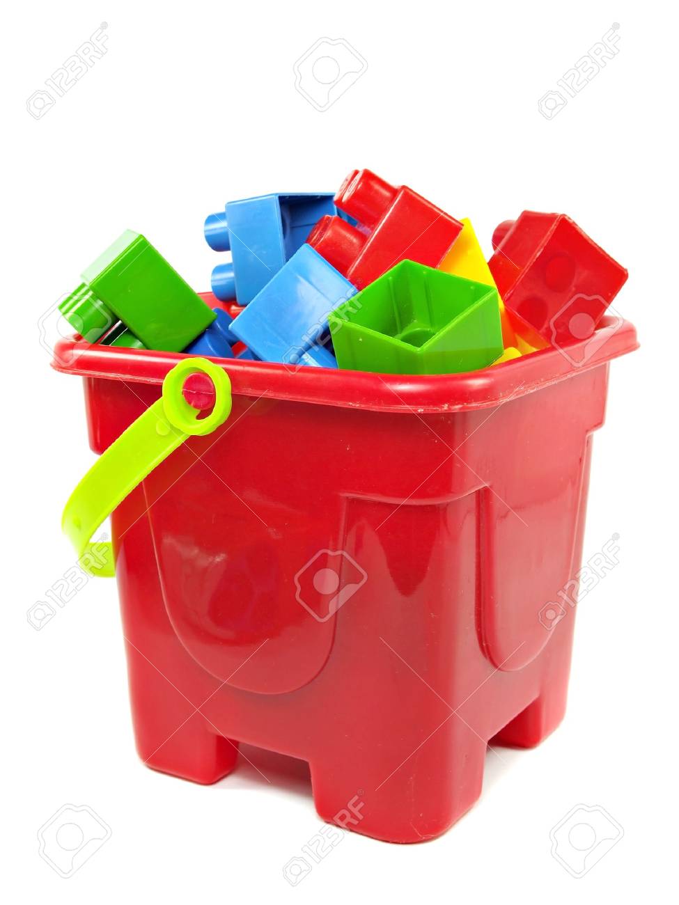 Uncategorized Toy Pail plastic building blocks in red toy pail on a white background stock photo 15554482