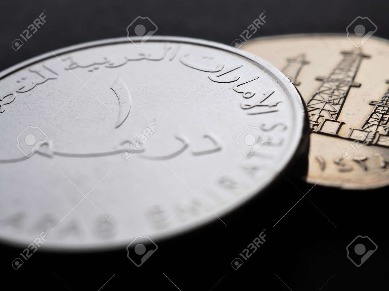 Translation: 1 Dirham United Arab Emirates. UAE Coins Close Up. National  Currency Of Emirates. Money Illustration. News About Emirati Dirham. AED.  Banking And Credit. Wages And Taxes. Macro Stock Photo, Picture and, image size:1300x975