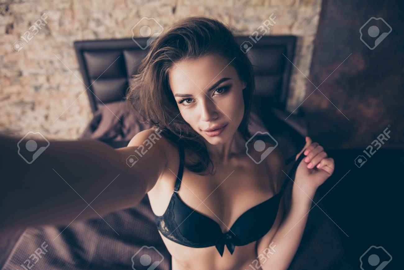 Close Up Of Sexy Naughty Young Brunette Lady Making Selfie In Bed.  Фотография, картинки, изображения и сток-фотография без роялти. Image  86520237