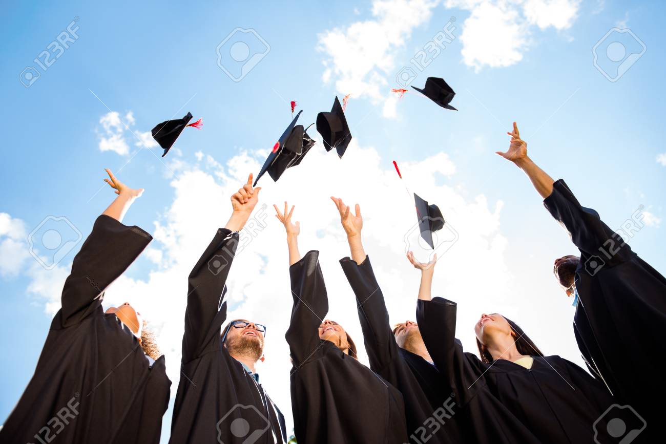 Low Angle Shot Of Cheerful Group Of Six Young Multi Ethnic
