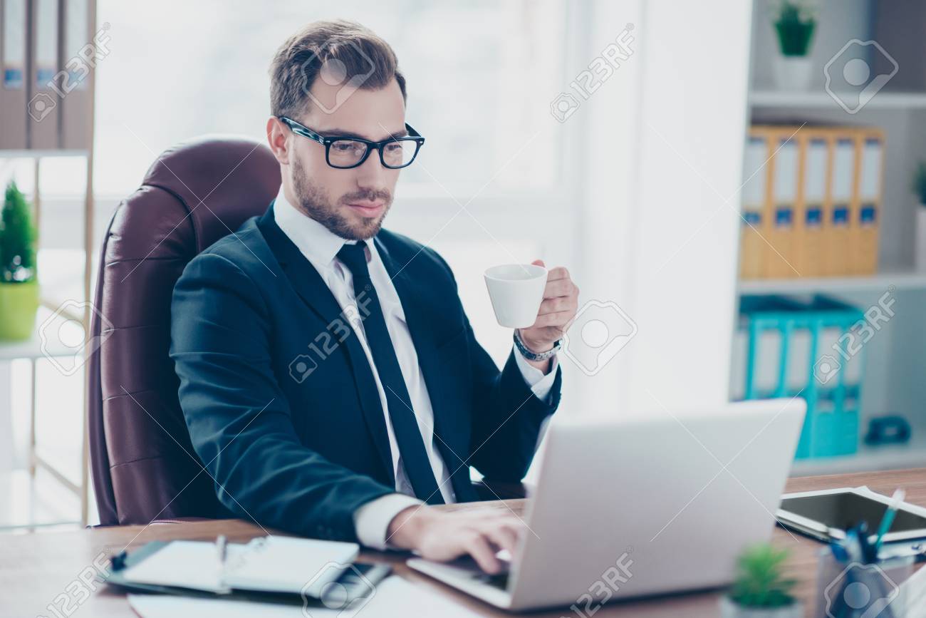 Leadership Leader People Professional Executive Chief Economist Manager Person Morning Concept. Portrait Of Serious Thoughtful Pensive Smart Elegant Banker Having Lunch Using Netbook Stock Photo, Picture And Royalty Free Image. Image 103229030.