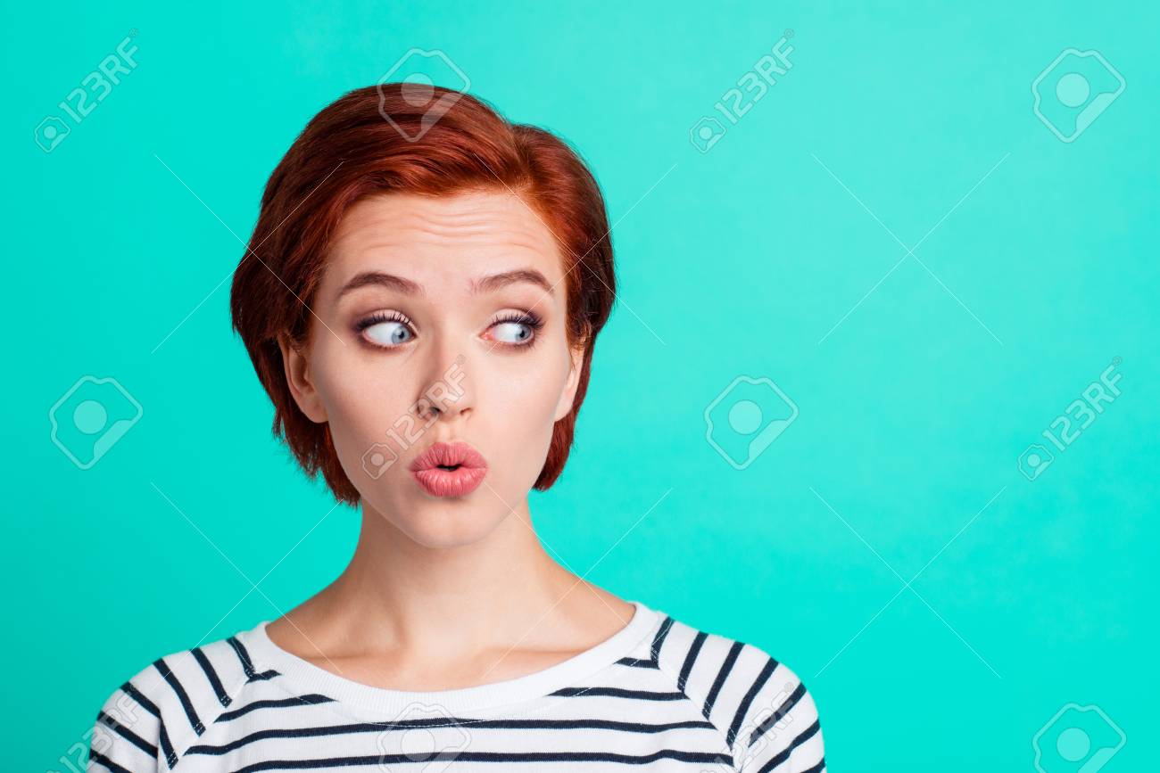 Close-up portrait of nice funny charming attractive lovely sweet red-haired lady in striped pullover air blow pouted lips looking aside isolated over bright vivid shine green turquoise background - 114000155 Close-up portrait of nice funny charming attractive lovely sweet red-haired lady in striped pullover air blow pouted lips looking aside isolated over bright vivid shine green turquoise background - 114000155