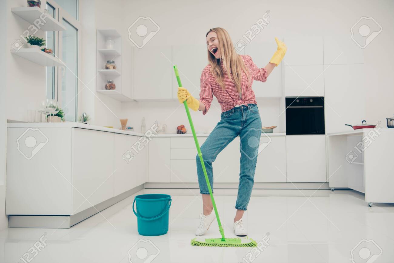 Full length body size photo beautiful amazing funky she her lady wash white floor housemaid karaoke day singing mop crazy movement wear jeans denim casual plaid checkered shirt bright light kitchen - 123895873 Full length body size photo beautiful amazing funky she her lady wash white floor housemaid karaoke day singing mop crazy movement wear jeans denim casual plaid checkered shirt bright light kitchen - 123895873
