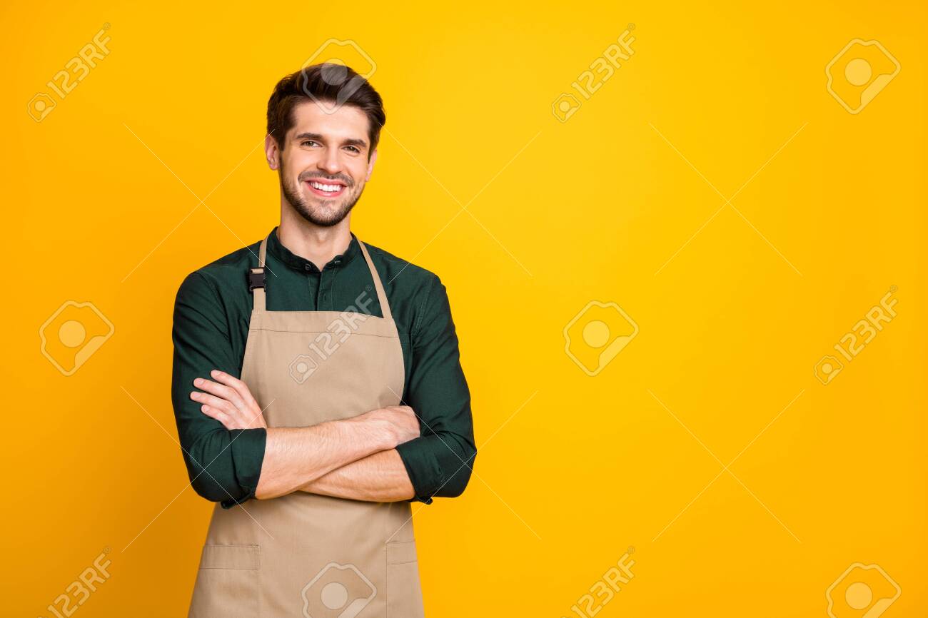 Photo of white cheerful positive man smiling toothily with arms crossed expressing positive emotions on face near empty space isolated bright color background - 133740089 Photo of white cheerful positive man smiling toothily with arms crossed expressing positive emotions on face near empty space isolated bright color background - 133740089