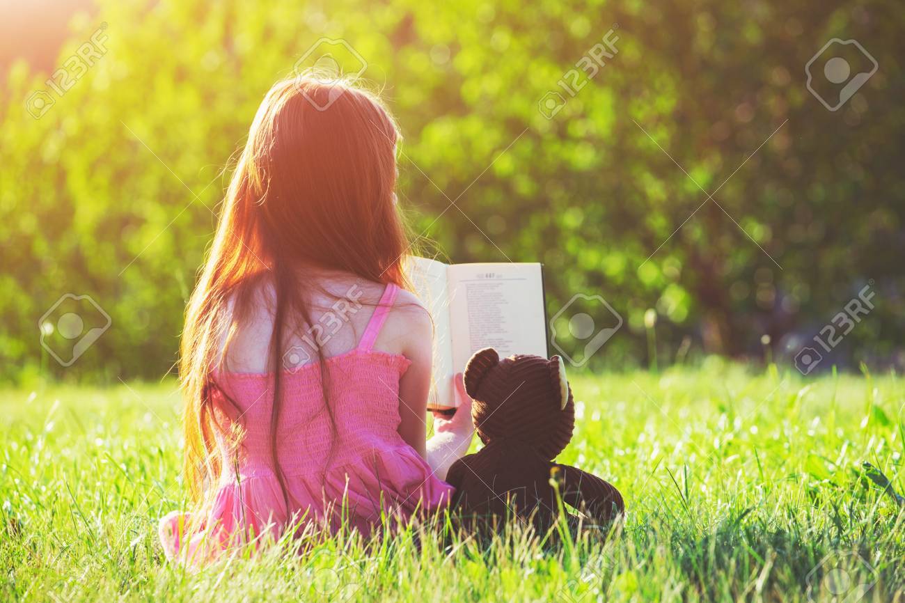 little girl with teddy