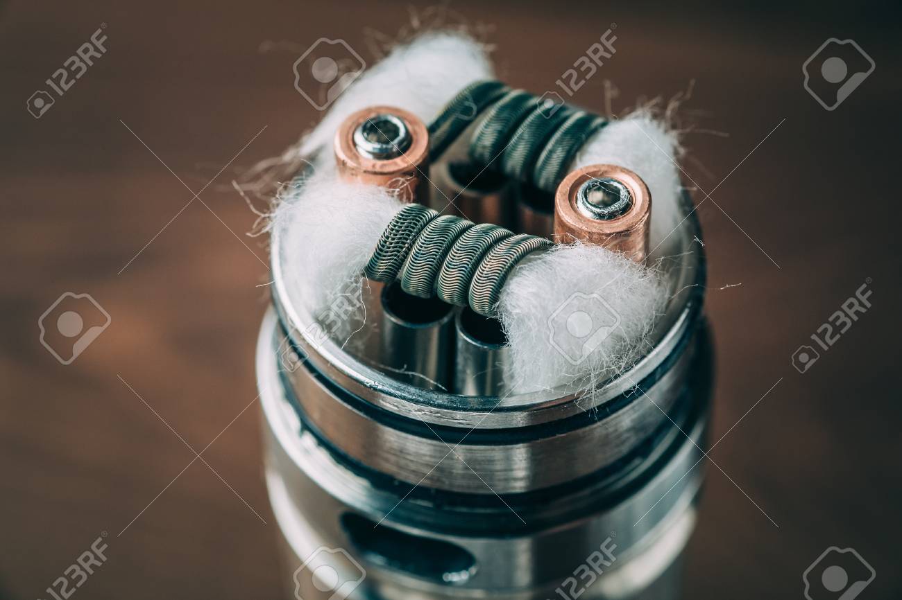 Rda Vape Device With Alien Clapton Coil And Japanese Organic Cotton For Vaping Close Up Modern Popular E Cigarette Or E Cig For Dripping And Inhaling Vapor Stock Photo Picture And Royalty Free