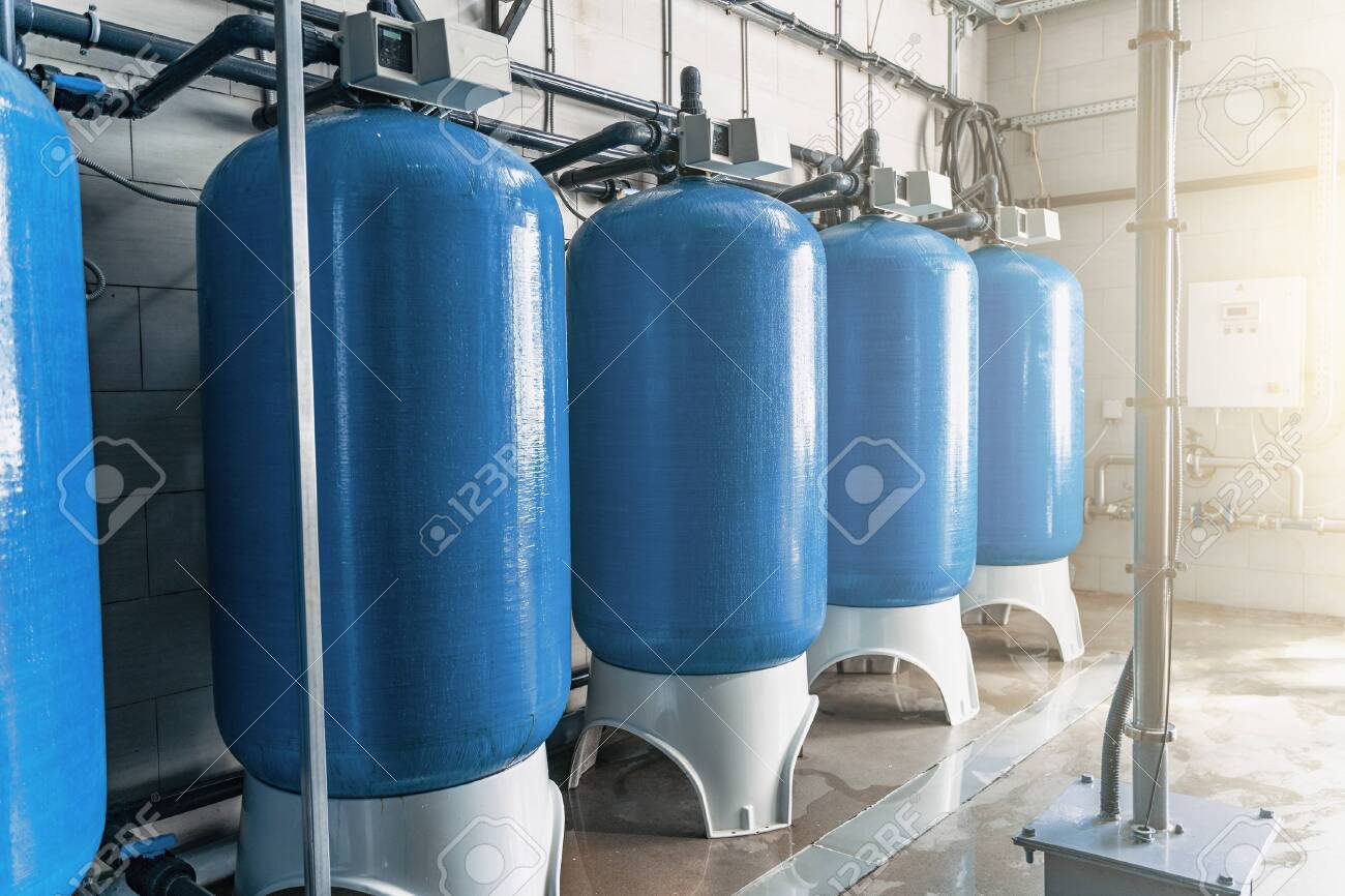 Purified drinking water factory or plant, large iron tanks and water purification filters and automation filtration system. - 130405859 Purified drinking water factory or plant, large iron tanks and water purification filters and automation filtration system. - 130405859