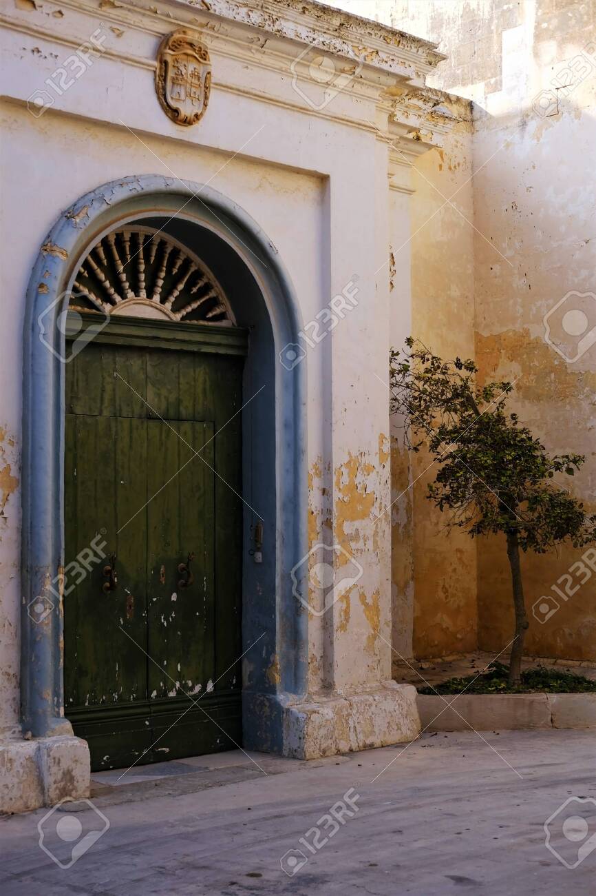 green door in a quiet cul-de-sac in Mdina, Malta - 140181199 green door in a quiet cul-de-sac in Mdina, Malta - 140181199