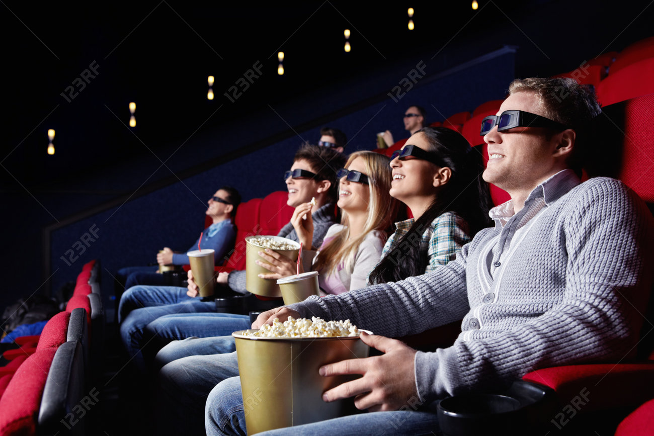 young people watch movies in cinema stock photo picture and royalty