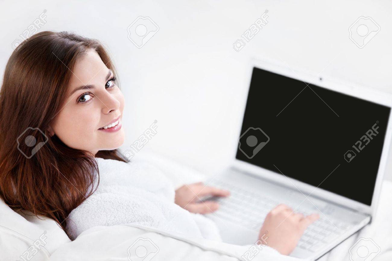 Beautiful young girl with laptop - 10259465 Beautiful young girl with laptop - 10259465