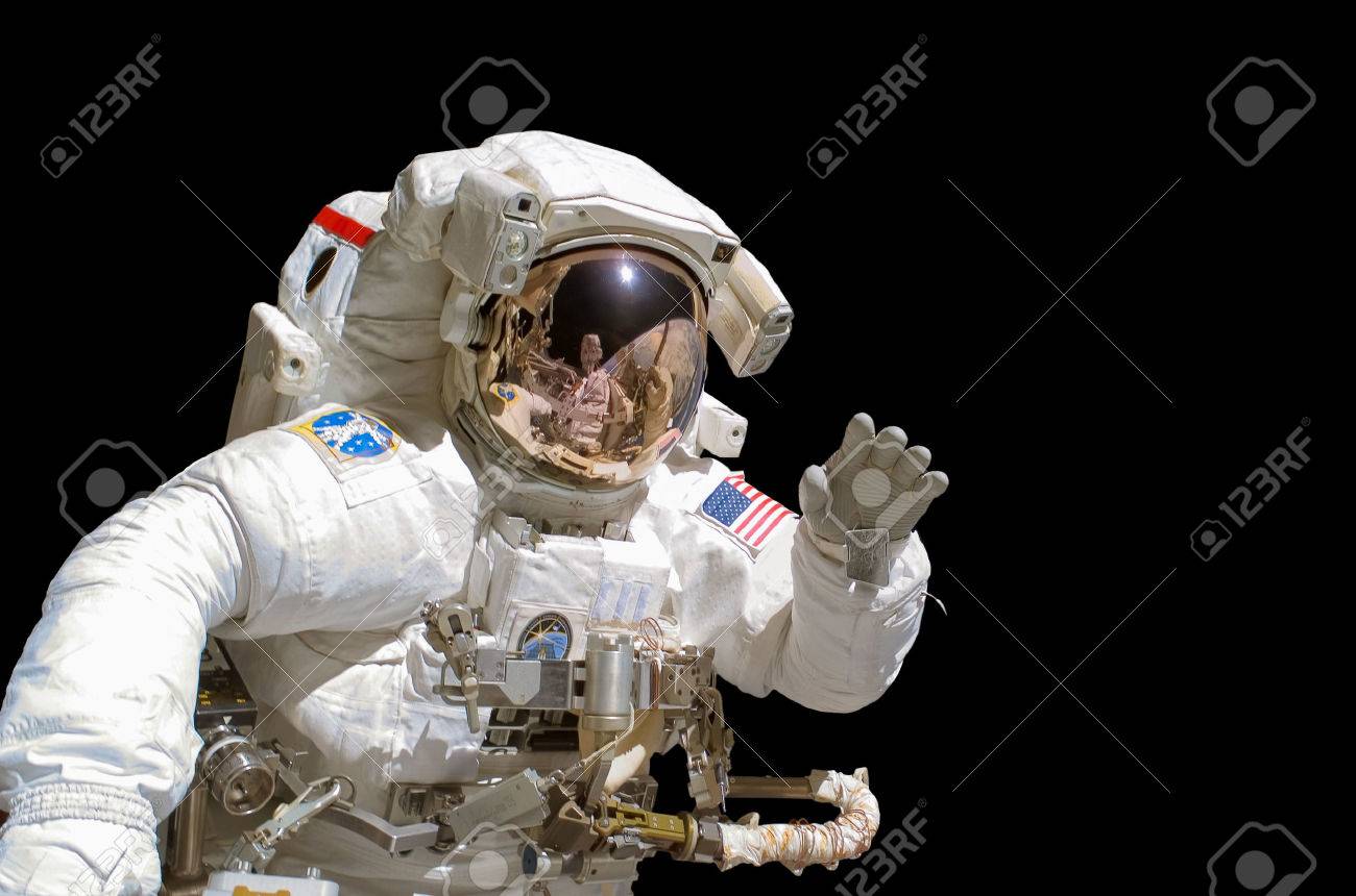 astronaut, standing spaceman isolated on black background Stock Photo -  Alamy