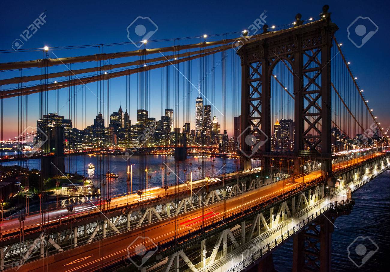 New York City - beautiful sunset over manhattan with manhattan and brooklyn bridge - 32773665 New York City - beautiful sunset over manhattan with manhattan and brooklyn bridge - 32773665