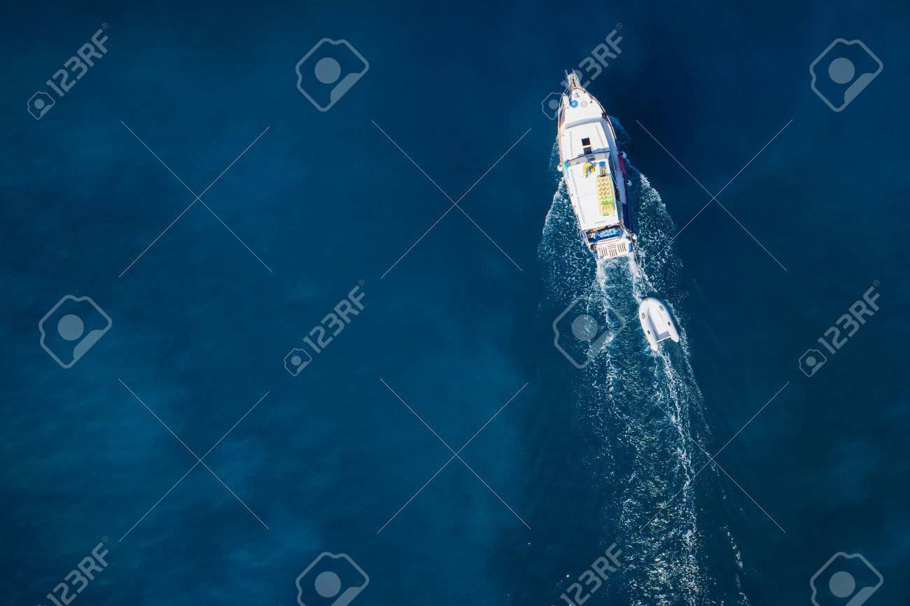 amazing view to yacht, swimming woman and clear water caribbean paradise - 32773880 amazing view to yacht, swimming woman and clear water caribbean paradise - 32773880