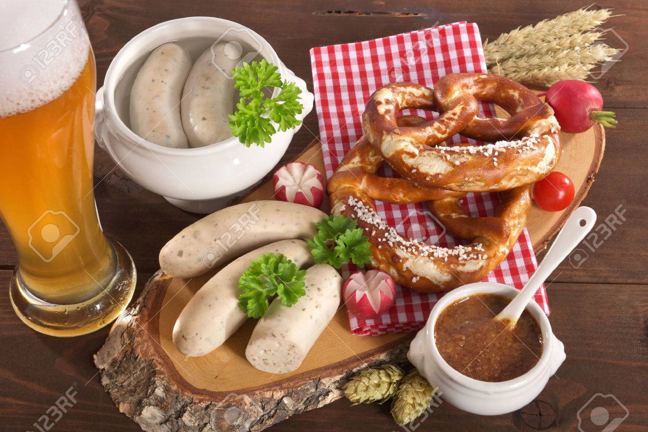 45054384-bavarian-veal-sausage-breakfast-with-sausages-wheat-beer-soft-pretzel-and-mild-mustard-on-dark.jpg