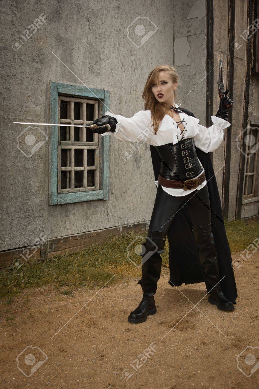 Fashion Portrait Of Sexy Woman In Pirate Style Holding Sword Stock Photo Picture And Royalty Free Image Image