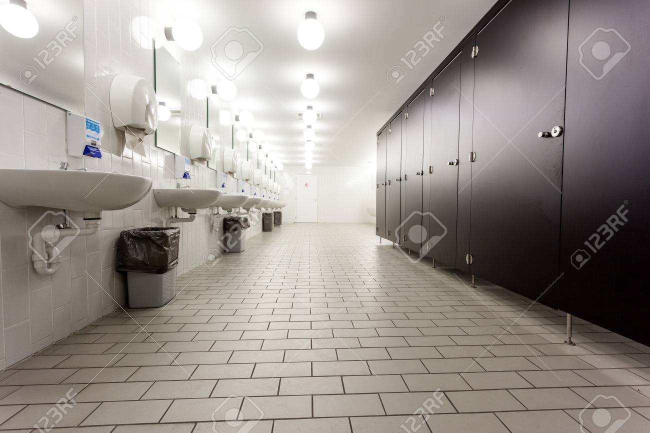 Mens restroom in an public building in white and black doors - 32103289 Mens restroom in an public building in white and black doors - 32103289
