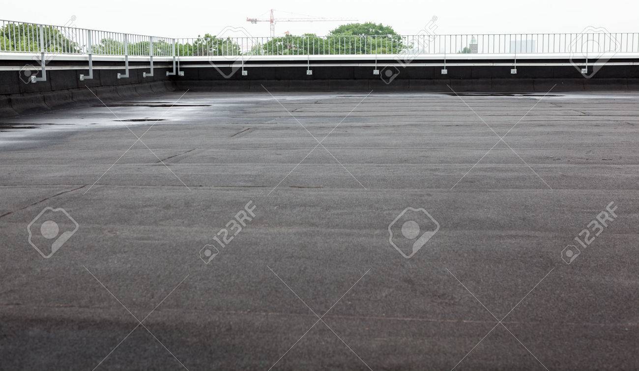 an flat roof with roofing and fencing - 60661794 an flat roof with roofing and fencing - 60661794