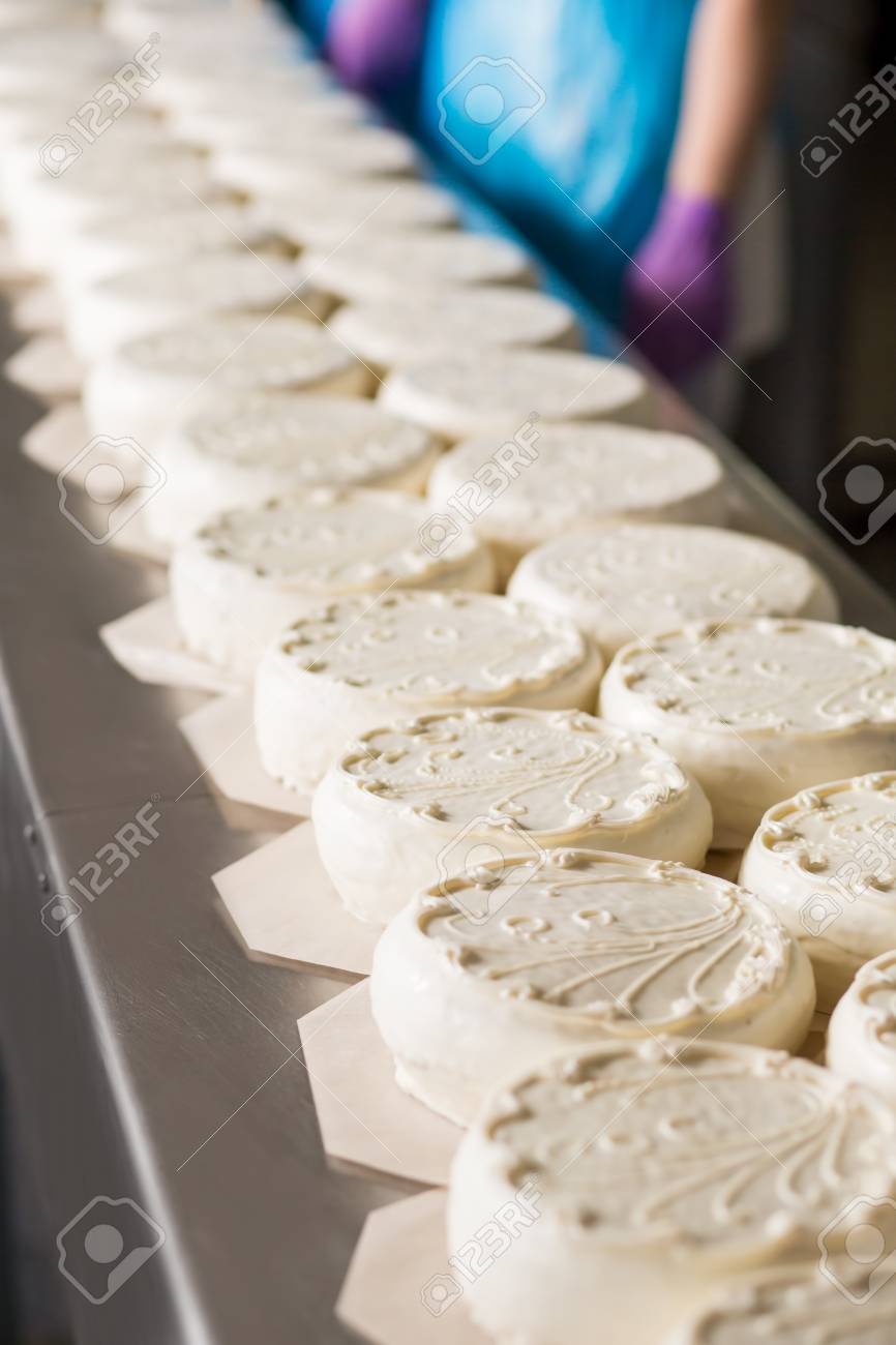 Long Rows Of White Cakes Lots Of Cakes On Conveyor New Design