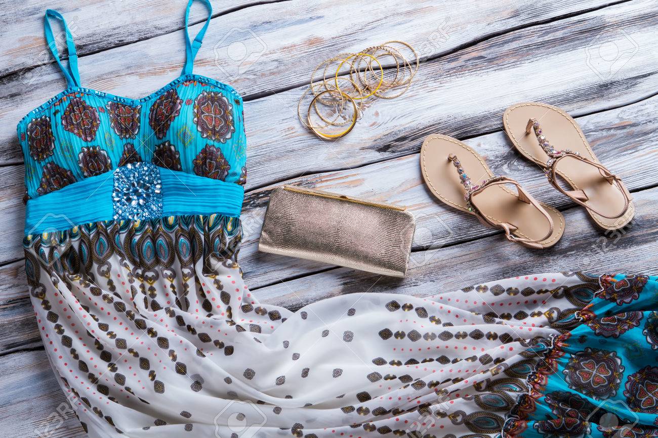 silver sandals and clutch bag