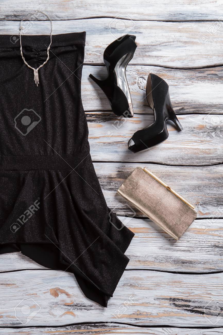 black dress and silver heels