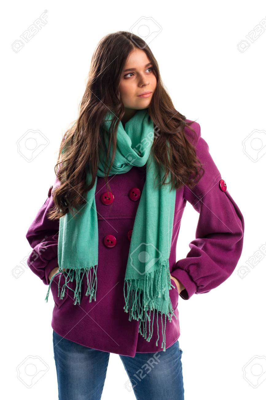 Girl in purple coat. Scarf with fringe and jeans. New fleece outerwear. Warm autumn outfit with scarf. - 59818729 Girl in purple coat. Scarf with fringe and jeans. New fleece outerwear. Warm autumn outfit with scarf. - 59818729