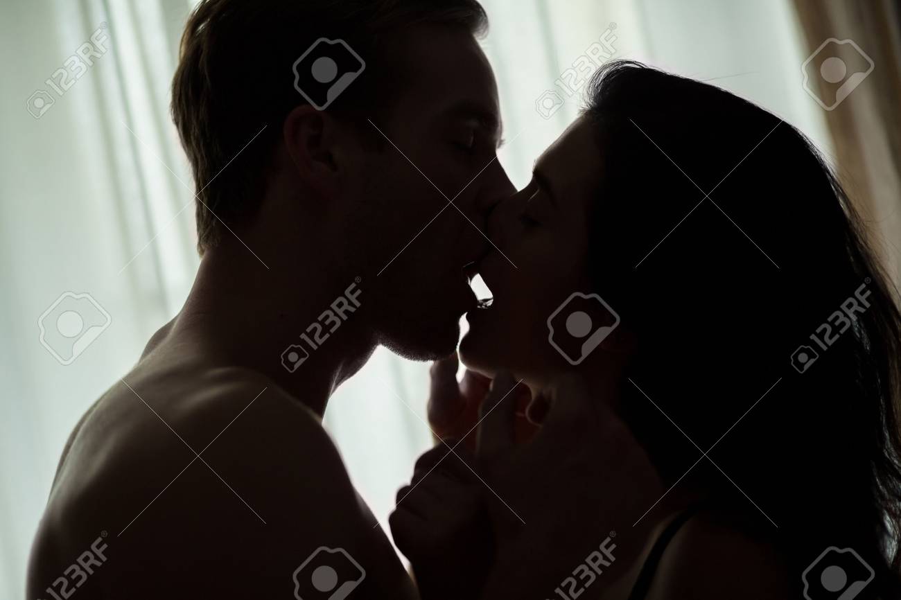 Couple Kissing In The Dark Man And Woman Indoor The Passion Stock Photo Picture And Royalty Free Image Image 70058747