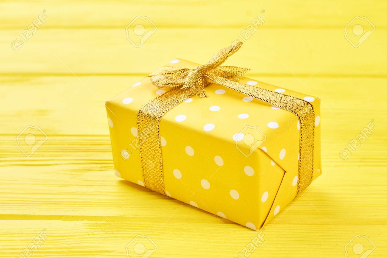 Download Yellow Gift Box On Yellow Background Yellow Dotted Gift Box Stock Photo Picture And Royalty Free Image Image 90679154 Yellowimages Mockups
