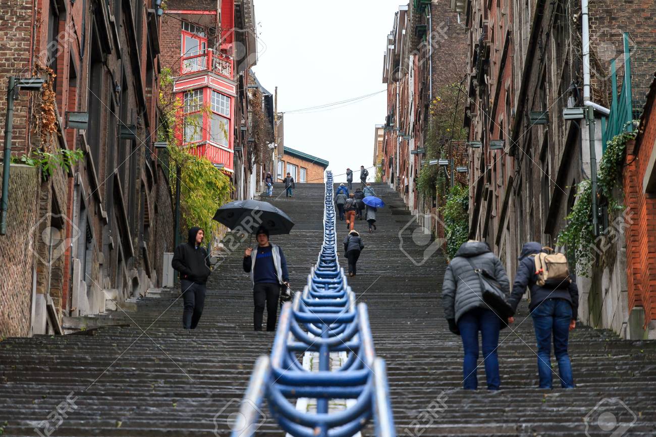 Tourists And Local People Climbing Up The Montagne De Bueren