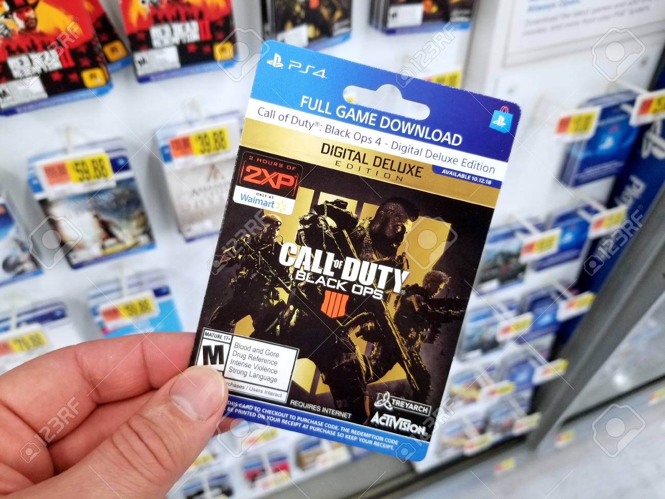 Plattsburgh, Usa - January 21, 2019 : Gift Card Of Call Of Duty Black Ops  Video Game For Ps4 In A Hand Of A Buyer At Walmart Store. Stock Photo,  Picture And
