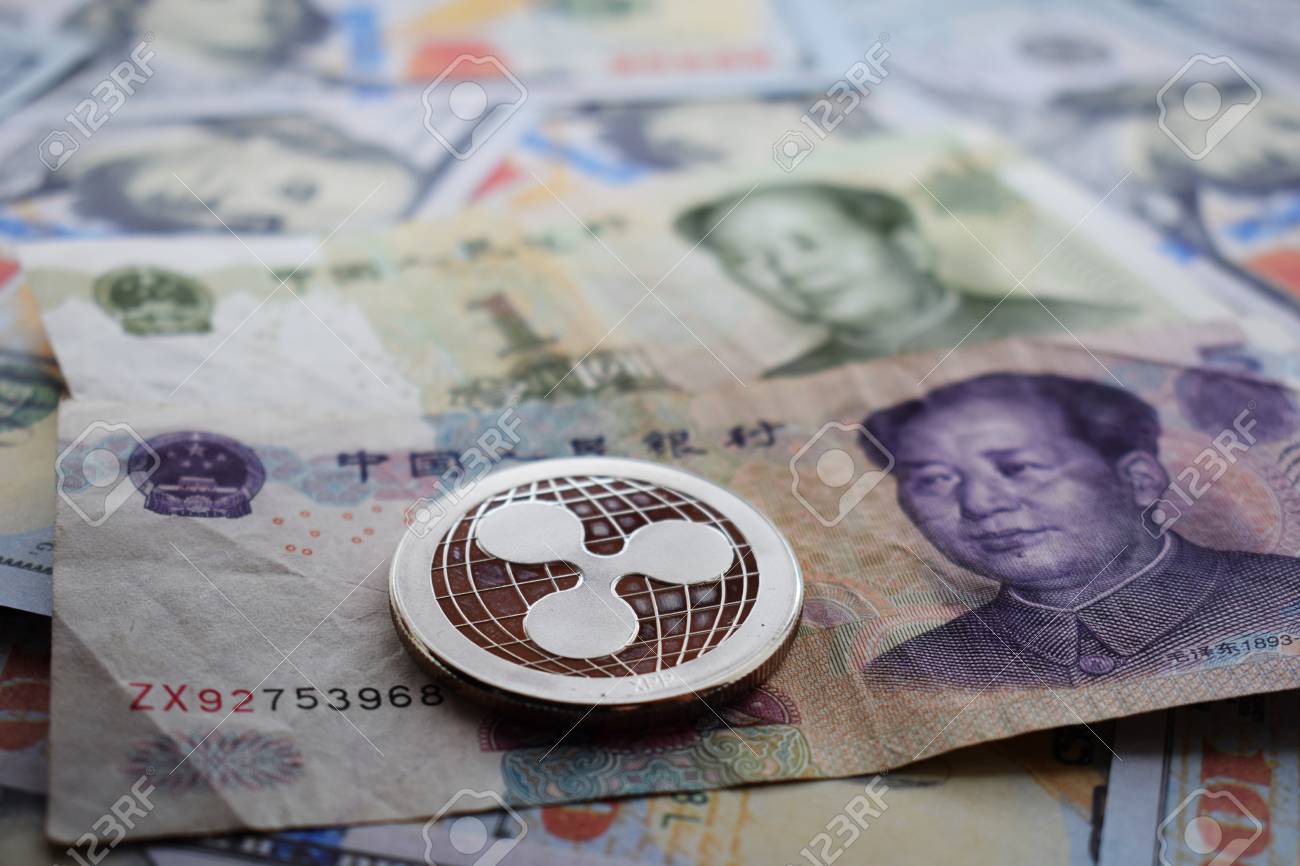 중국 위안화와 미국 달러에 대한 Ripple Xrp 동전이 닫힙니다. 로열티 무료 사진, 그림, 이미지 그리고 스톡포토그래피.  Image 120535800