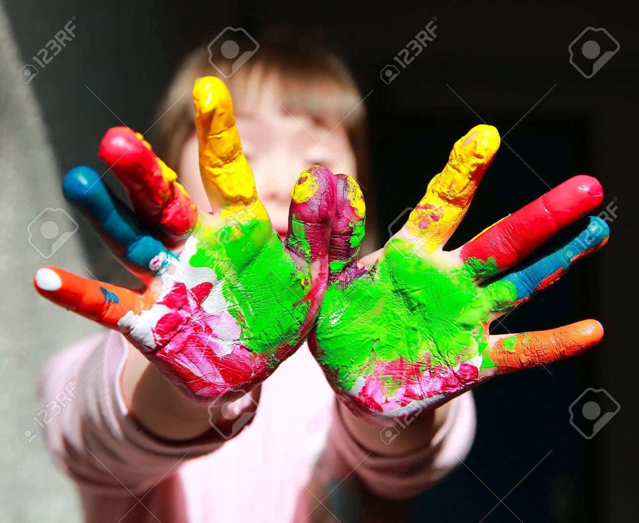 Cute little kid with painted hands - 63018501 Cute little kid with painted hands - 63018501