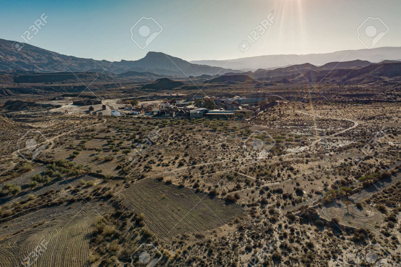 Drone above view of Tabernas Desert Landscape Texas Hollywood Fort Bravo the western style theme park in Almeria Andalusia Spain Europe - 165004143 Drone above view of Tabernas Desert Landscape Texas Hollywood Fort Bravo the western style theme park in Almeria Andalusia Spain Europe - 165004143