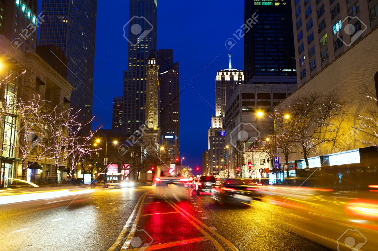 Michigan Avenue And Magnificent Mile With Traffic At Night, Chicago, IL,  USA Stock Photo, Picture and Royalty Free Image. Image 23118545.