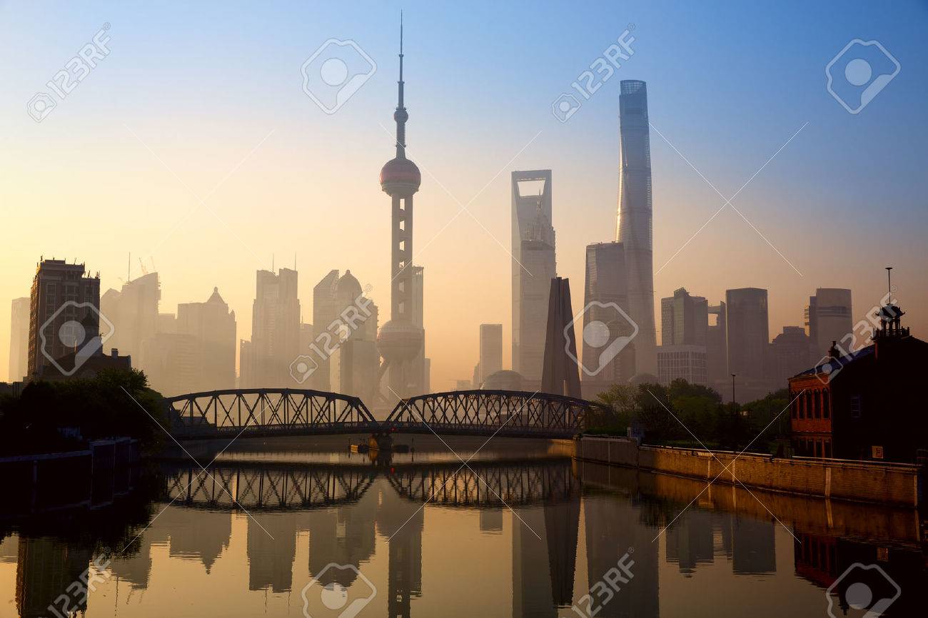 Shanghai skyline at sunrise with historical Waibaidu bridge China - 39967659 Shanghai skyline at sunrise with historical Waibaidu bridge China - 39967659