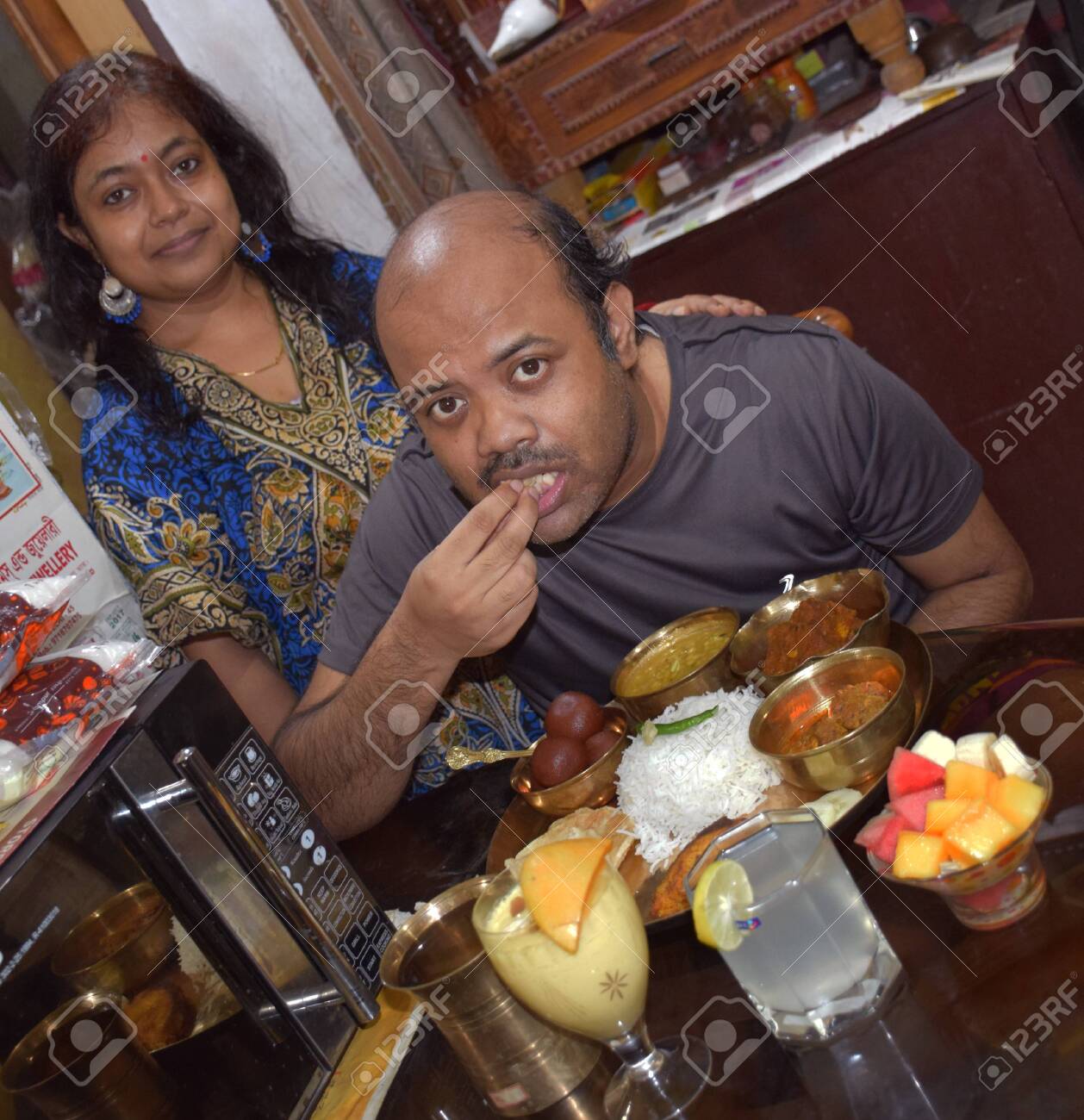 An Indian Bengali Man Eating Food photo