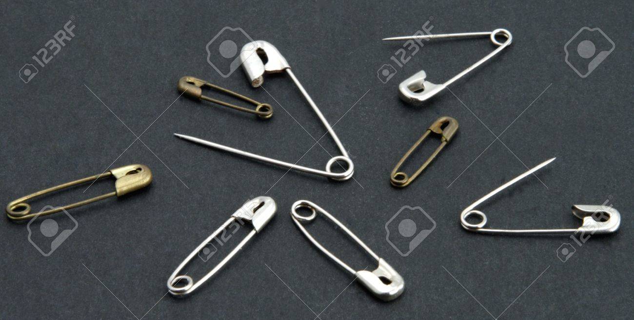 Old Vintage Safety Pins Stainless And Brass On Black Background Stock Photo Picture And Royalty Free Image Image 2626299