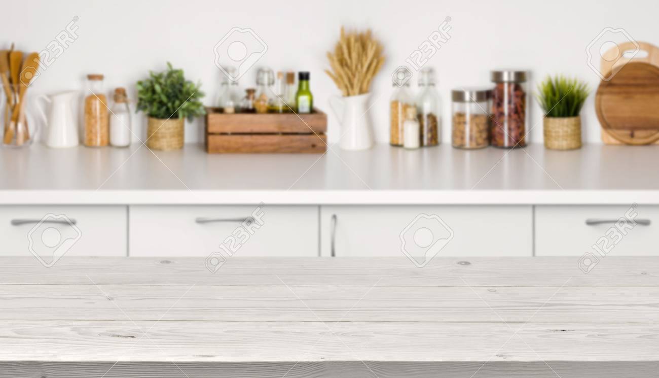 Empty wooden table with bokeh image of kitchen bench interior - 70273105 Empty wooden table with bokeh image of kitchen bench interior - 70273105