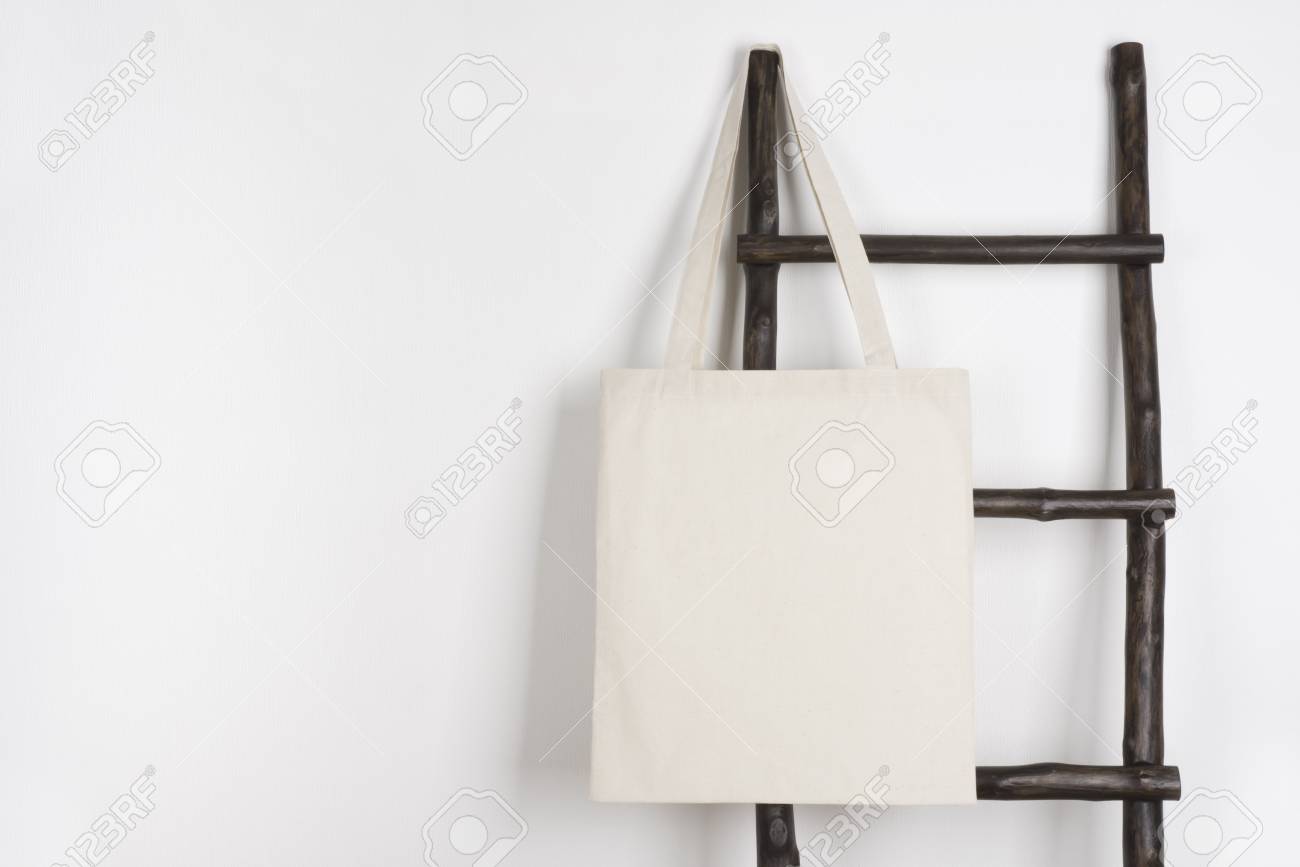 Download Fabric Cloth Shopping Bag Mockup Hanging On Vintage Wooden Stepladder Stock Photo Picture And Royalty Free Image Image 93211478