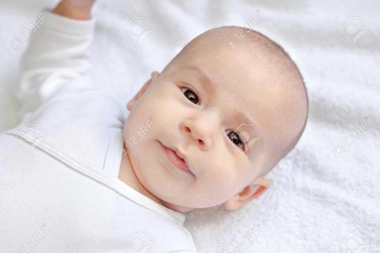 Beautiful Sweet Baby Child Enjoy On Bed Stock Photo Picture And Royalty Free Image Image