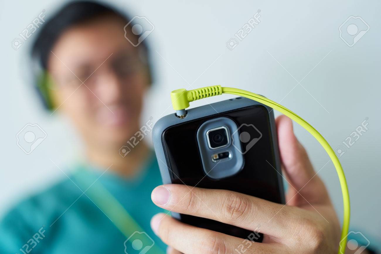 chinese man watching podcast